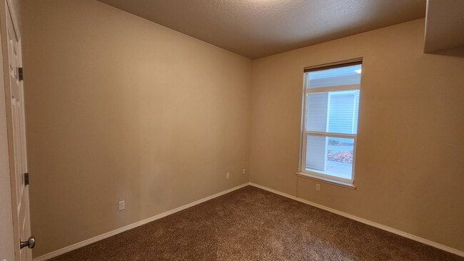 Building Photo - Two Bedroom Condo Near Moose Can Gully with a Garage