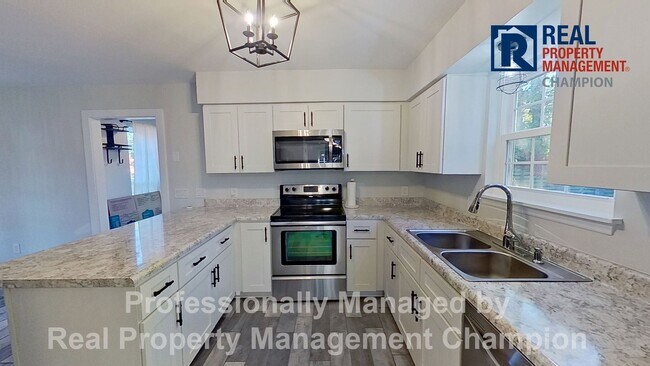 Building Photo - Beautifully Updated Home Featuring Fenced Yard and Hot Tub