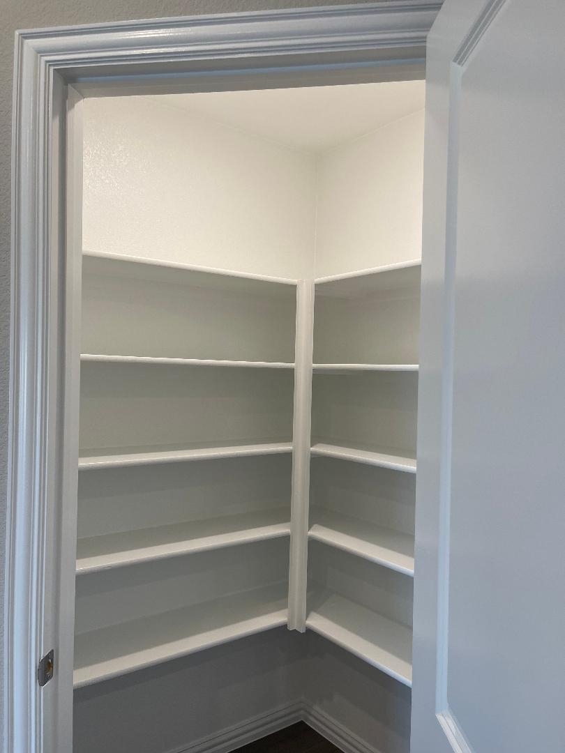 walk in spacious kitchen pantry - 608 Easthill Dr
