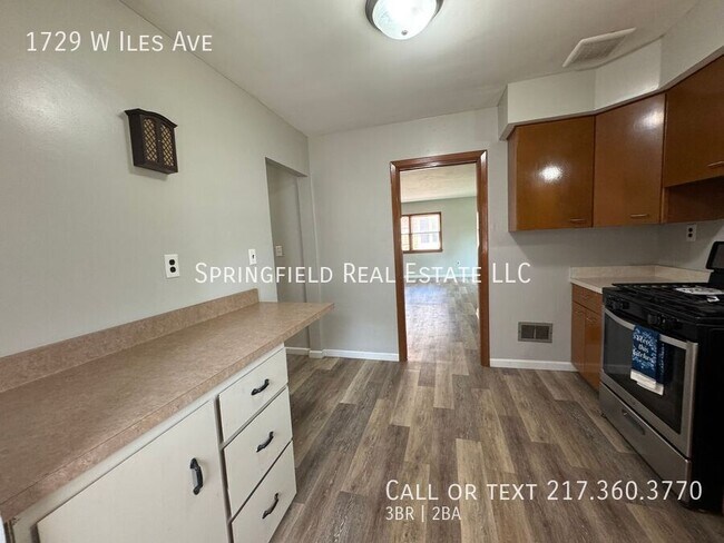 Building Photo - 1729 W Iles Ave