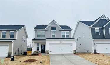 Building Photo - 3/2.5 Almost Brand New Home Ready For Move...