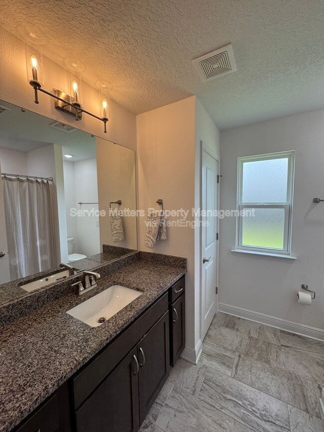 Building Photo - 5641 Micanopy Dr