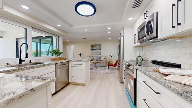 Building Photo - 6380 3rd Palm Point