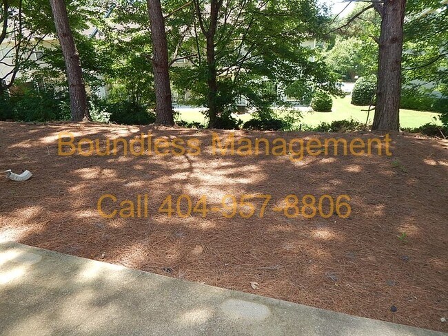 Building Photo - Larger Than It Looks! 3 BR/2.5 BA Town Hom...