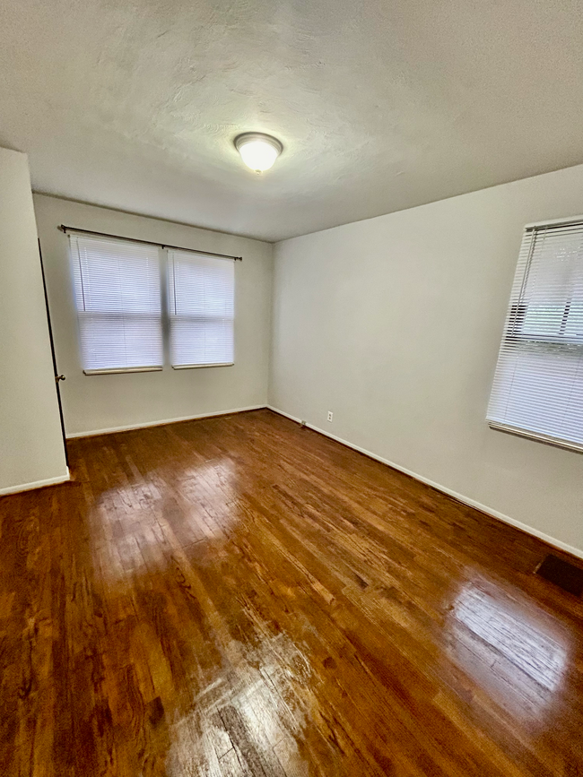 Polished wood floor – bedroom - 6516 Oleatha Ave