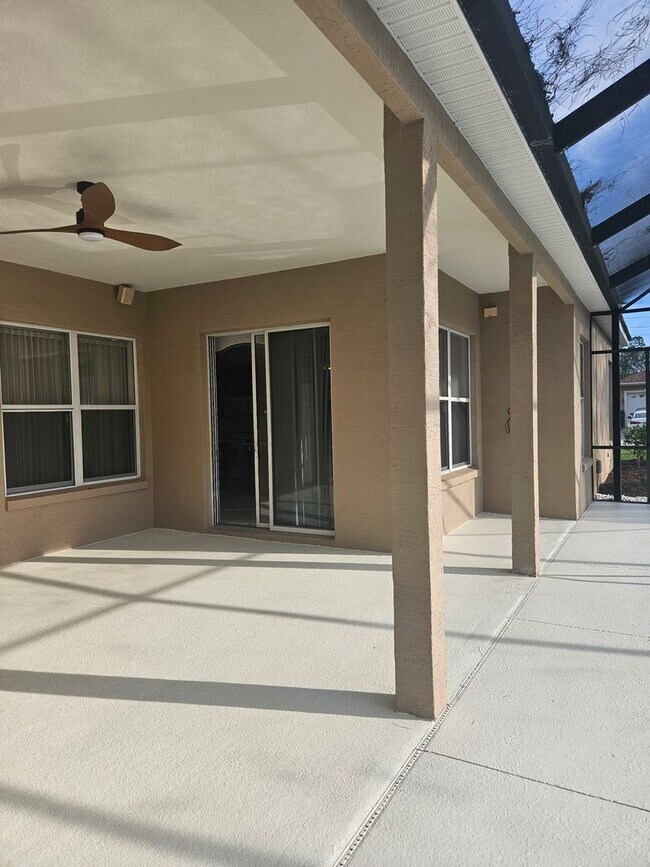 Building Photo - 4 BEDROOM 3 FULL BATH HOME WITH A SCREENED IN POOL IN THE BEAUTIFUL PALM COAST