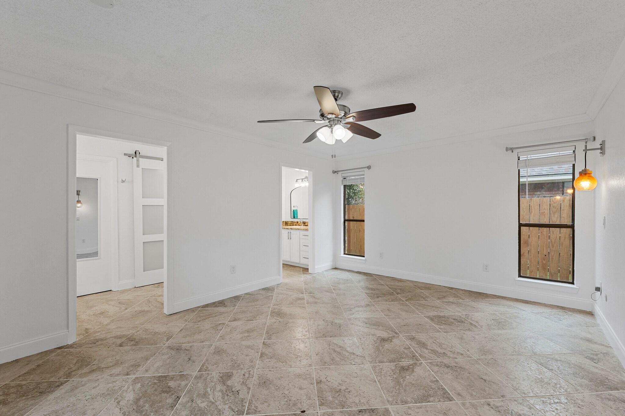 main bedroom into main bathroom - 7105 Fish Pond Rd