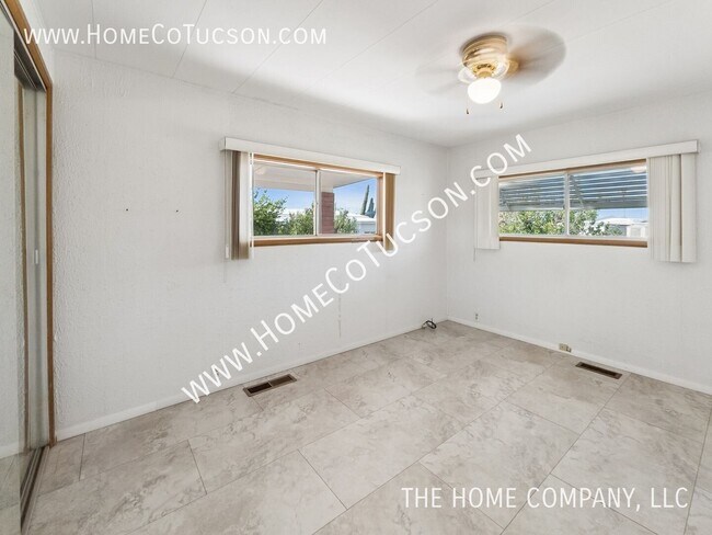 Building Photo - 10675 N Kilimanjaro Ave
