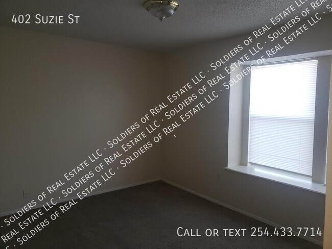 Building Photo - 402 Suzie St