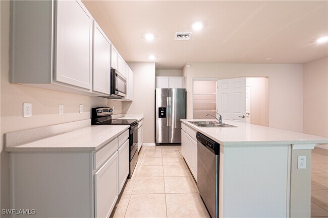 Building Photo - 15421 Wildflower Cir