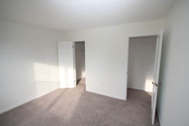 Building Photo - *Coming Soon*  Upgraded End Unit Townhome ...