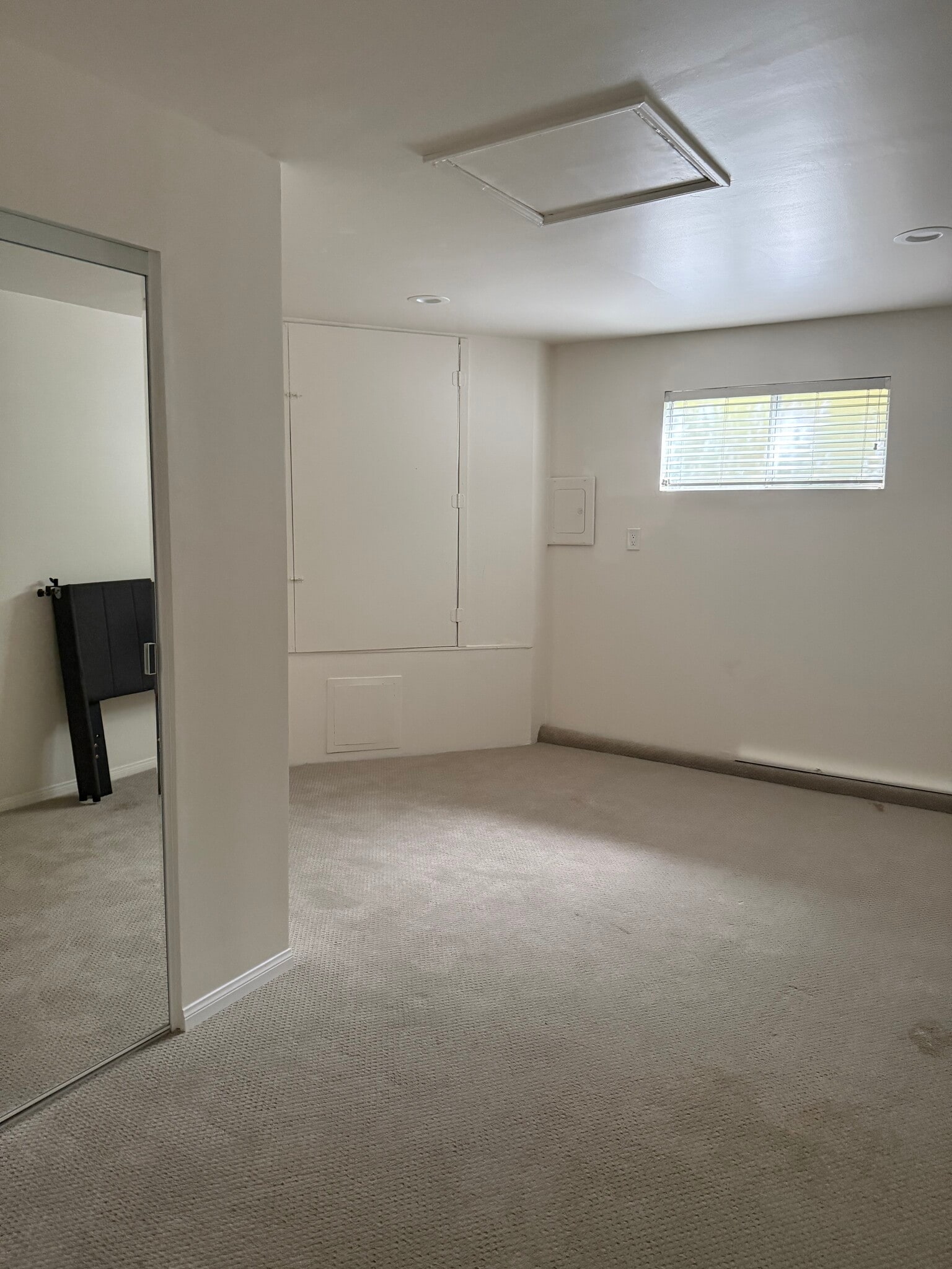 view of bdrm. lookingu towards window - 305 Emerald St