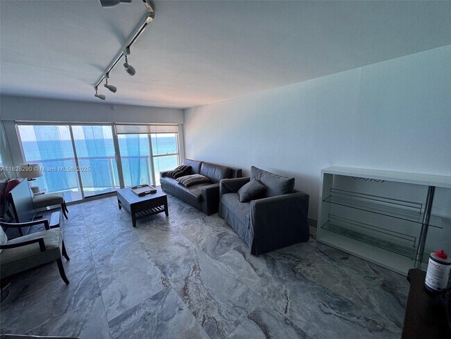 Building Photo - 6767 Collins Ave