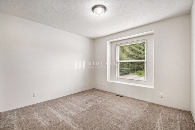 Building Photo - Ranch Townhome in Shadow View