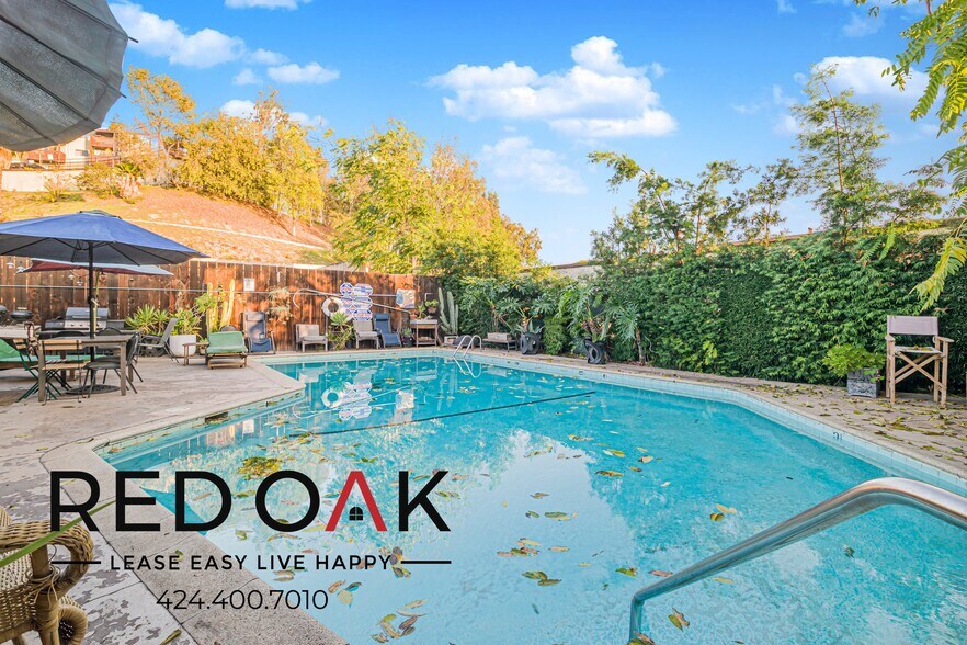 Building Photo - 211 S Ave 57