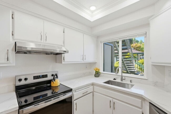 Building Photo - New Remodeled, Downstairs with Two Patios, Gated Community with Pool