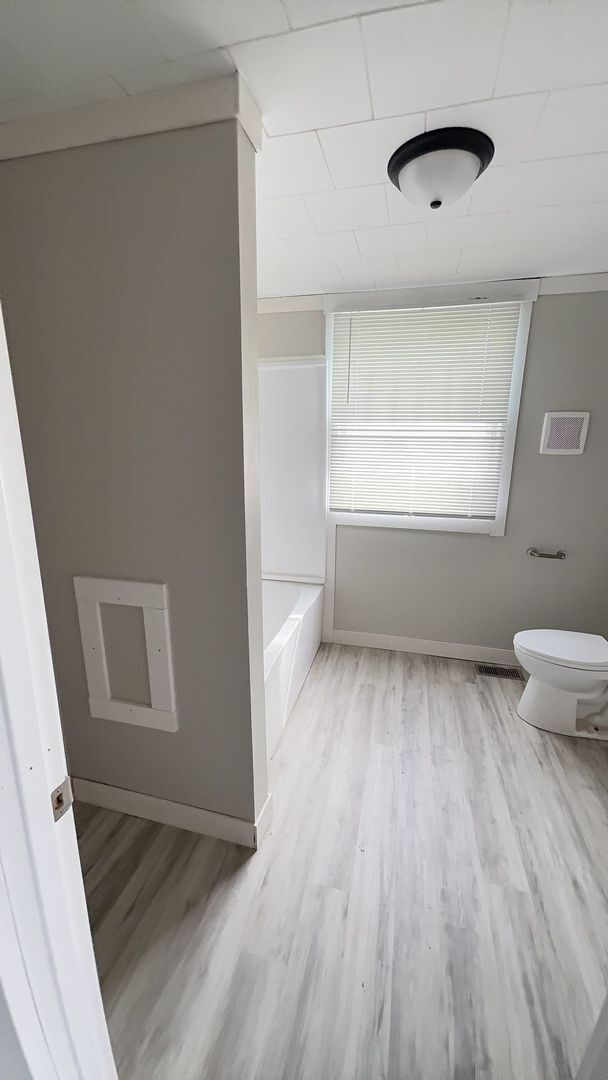 Building Photo - 3 Bedrooms with Fenced In Yard + Garage