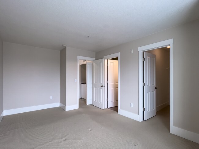 Building Photo - Enjoy this 3 Bedroom 2.5 Bathroom End Townhome ~ 2 Car Garage + Washer & Dryer! Great Cedar Mill ...