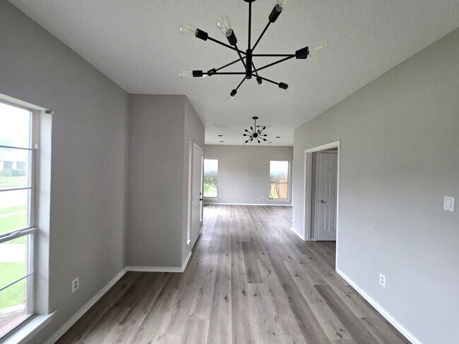 Building Photo - Spacious 4-Bedroom Home with Pool & Spa in...