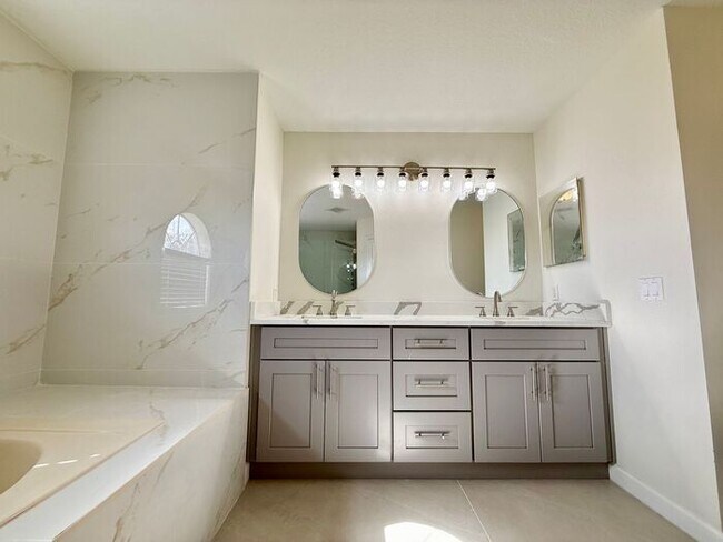 Building Photo - GORGEOUS, Large Completely Renovated Two-Story 4/2.5 PLUS LOFT in POINCIANA VILLAGES!