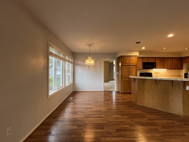 Building Photo - Elegant Home Offering Open Living Spaces, Spacious Primary Suite, and Nature-Inspired Yard