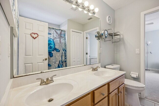 Building Photo - Coastal Living Just 2 Blocks from the Beach | Gated Community + Resort Amenities