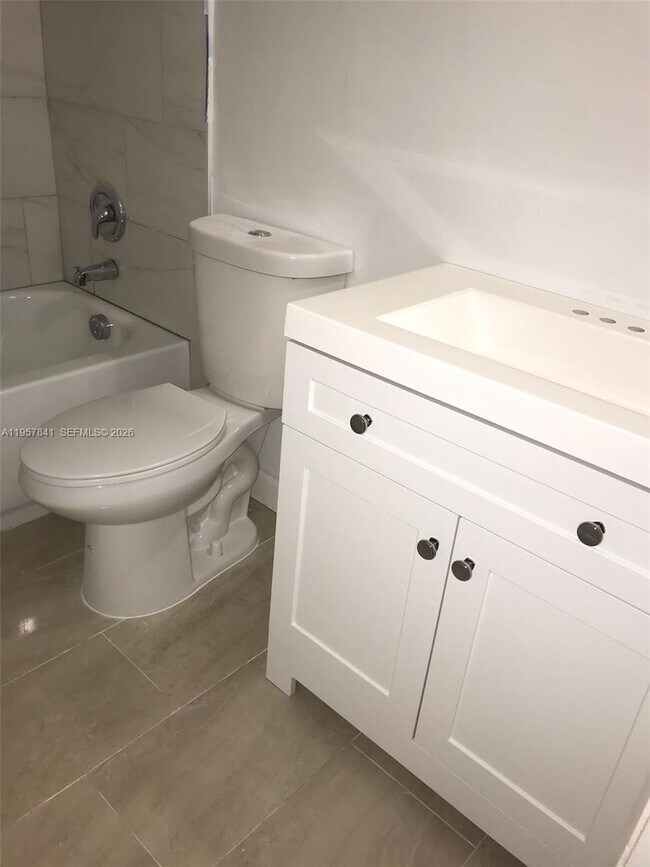 Building Photo - 8550 N Sherman Cir