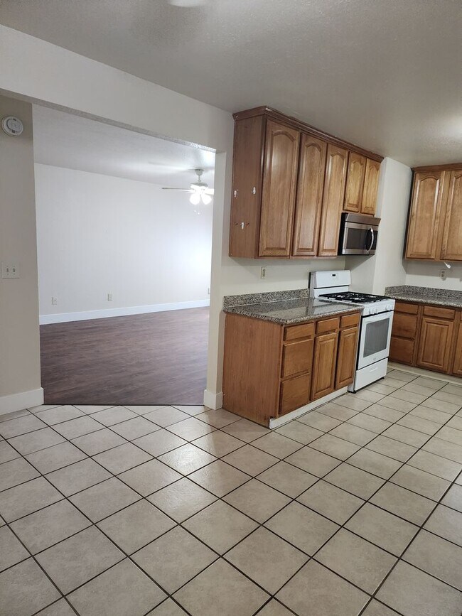 Building Photo - 3 bedroom 1 bath with Garage converted to ...