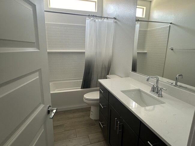His or her Bathroom - 3110 N 199th Dr
