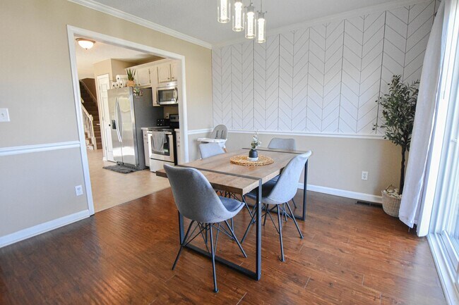 Building Photo - Pet Friendly Three Bedroom with Bonus!
