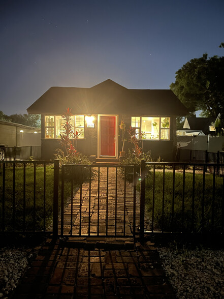FRONT AT NIGHT - 1035 Queen St N