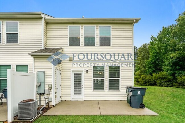 Building Photo - End Unit Townhome | Back Patio With Privac...