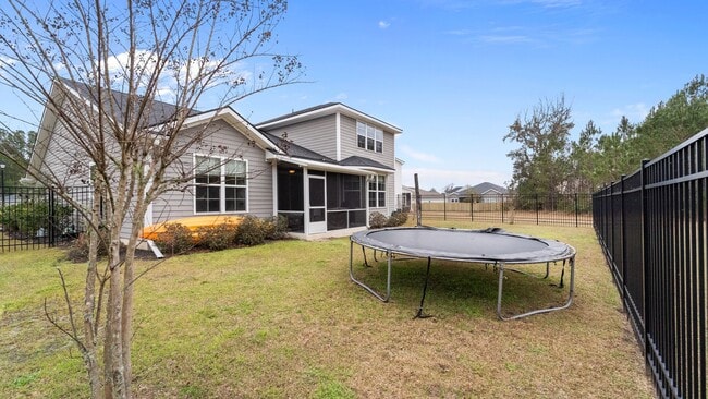 Building Photo - Spacious 6-Bedroom Waterfront Home in Richmond Hill, GA