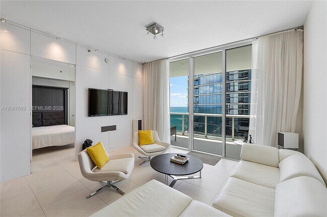 Building Photo - 15811 Collins Ave