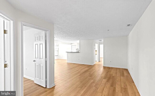 Building Photo - Welcome to Piney Orchard! This beautifully updated 2-bedroom, 2-bath condominium!