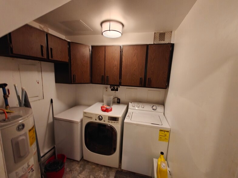 Laundry room with washer and dryer. - 29 Peter Way