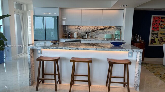 Building Photo - 6301 Collins Ave