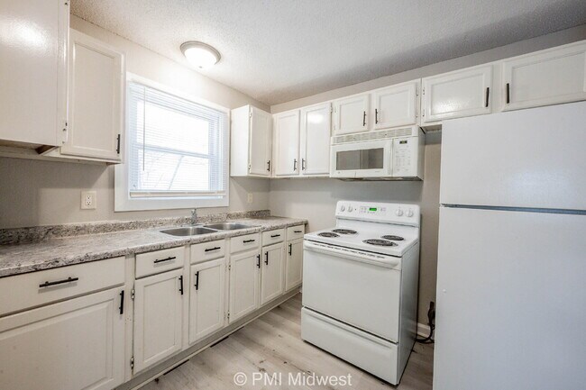 Building Photo - "Charming 3-Bedroom Gem on Udell Street with Spacious Living – 1104 Sq. Ft., Indianapolis!"