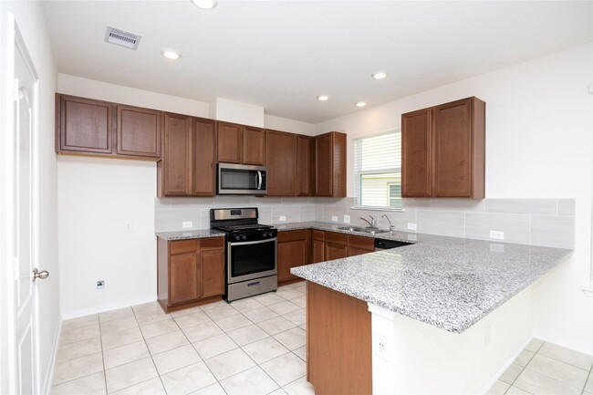 Building Photo - 702 Hardwood Grv Ct