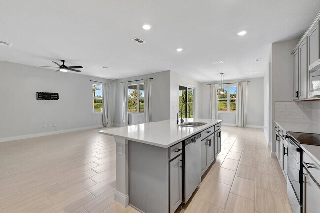 Building Photo - Spacious 4BR Home in Port St. Lucie – Modern Comfort Awaits