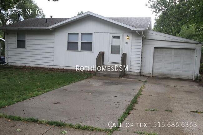 Building Photo - 3 bedroom 2 bath with attached garage Full...