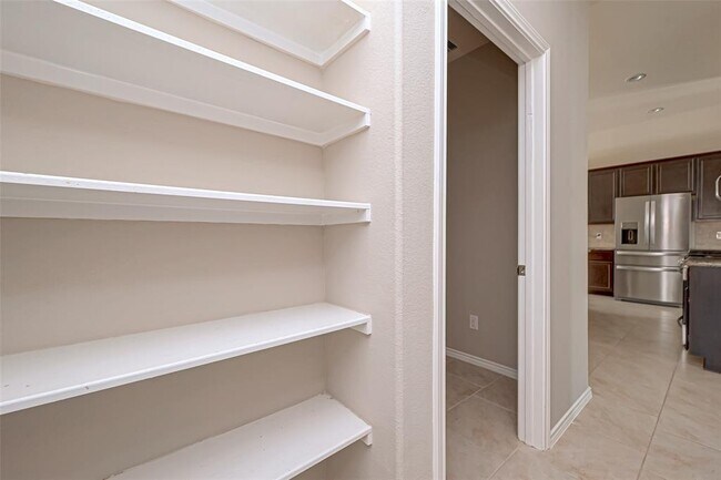 Building Photo - 8402 Coral Cove Pass Ln