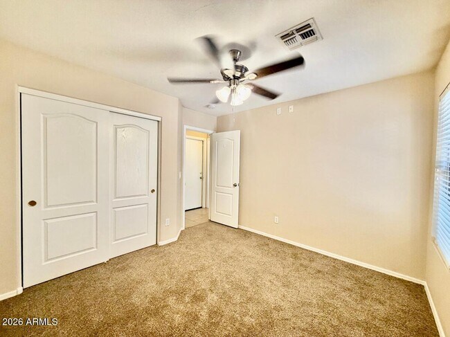 Building Photo - 9323 W Harmony Ln