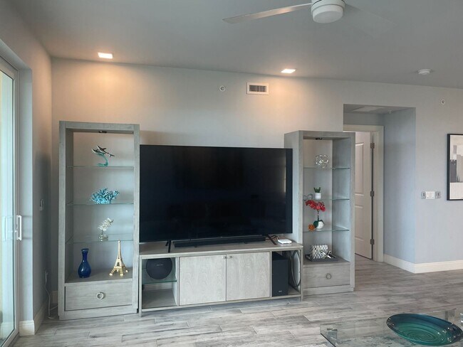 Building Photo - Coastal Luxury at Hidden Bay | 3BR Waterfront Condo with Bay Views