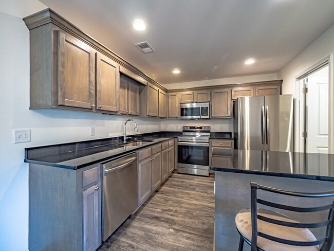 Building Photo - Available now! Has solar panels!