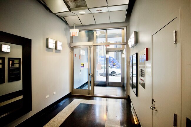 Building Photo - 1 E 8th St