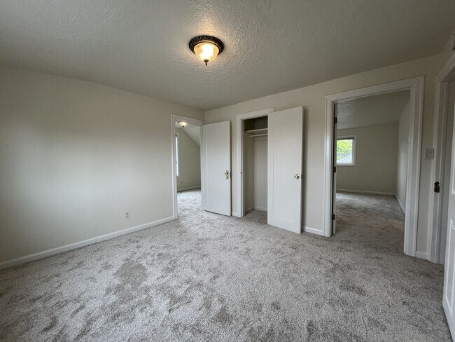 Building Photo - Character-Filled Concordia Home with Flexible Living Spaces & Gas Fireplace