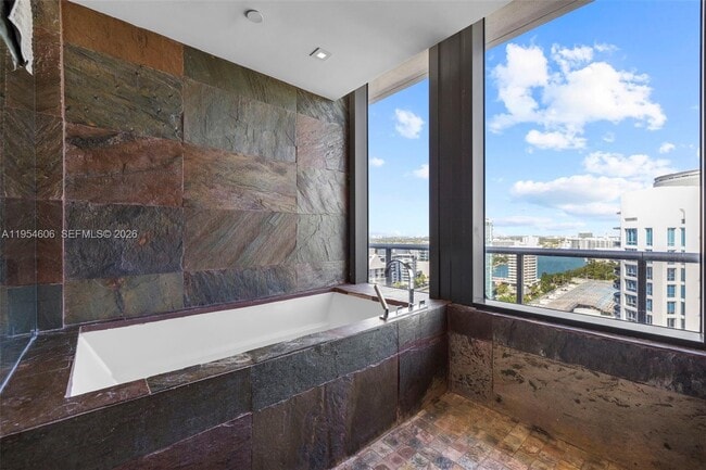 Building Photo - 5875 Collins Ave