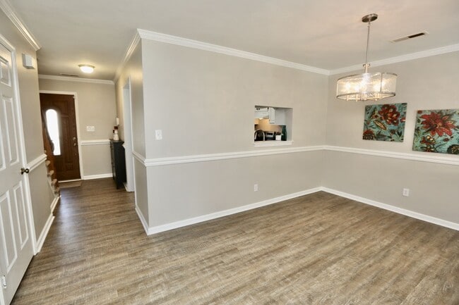Building Photo - Updated End-Unit Brick Townhome Ready NOW!...