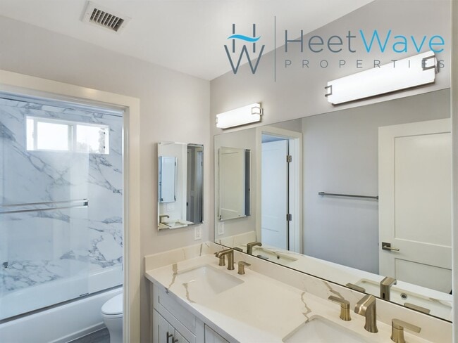 Building Photo - REZKO - E Street